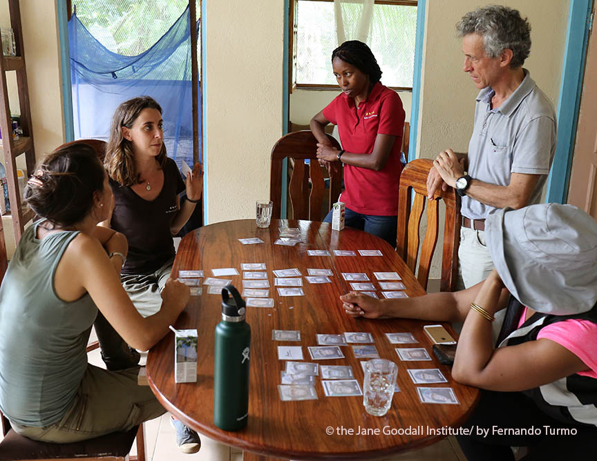 Carlos listens to the explanations of Sofia, Rebeca, Atencia, JGI Congo director
