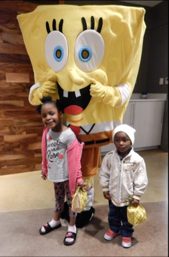 Stewart (dressed as Spongebob Squarepants) with community members