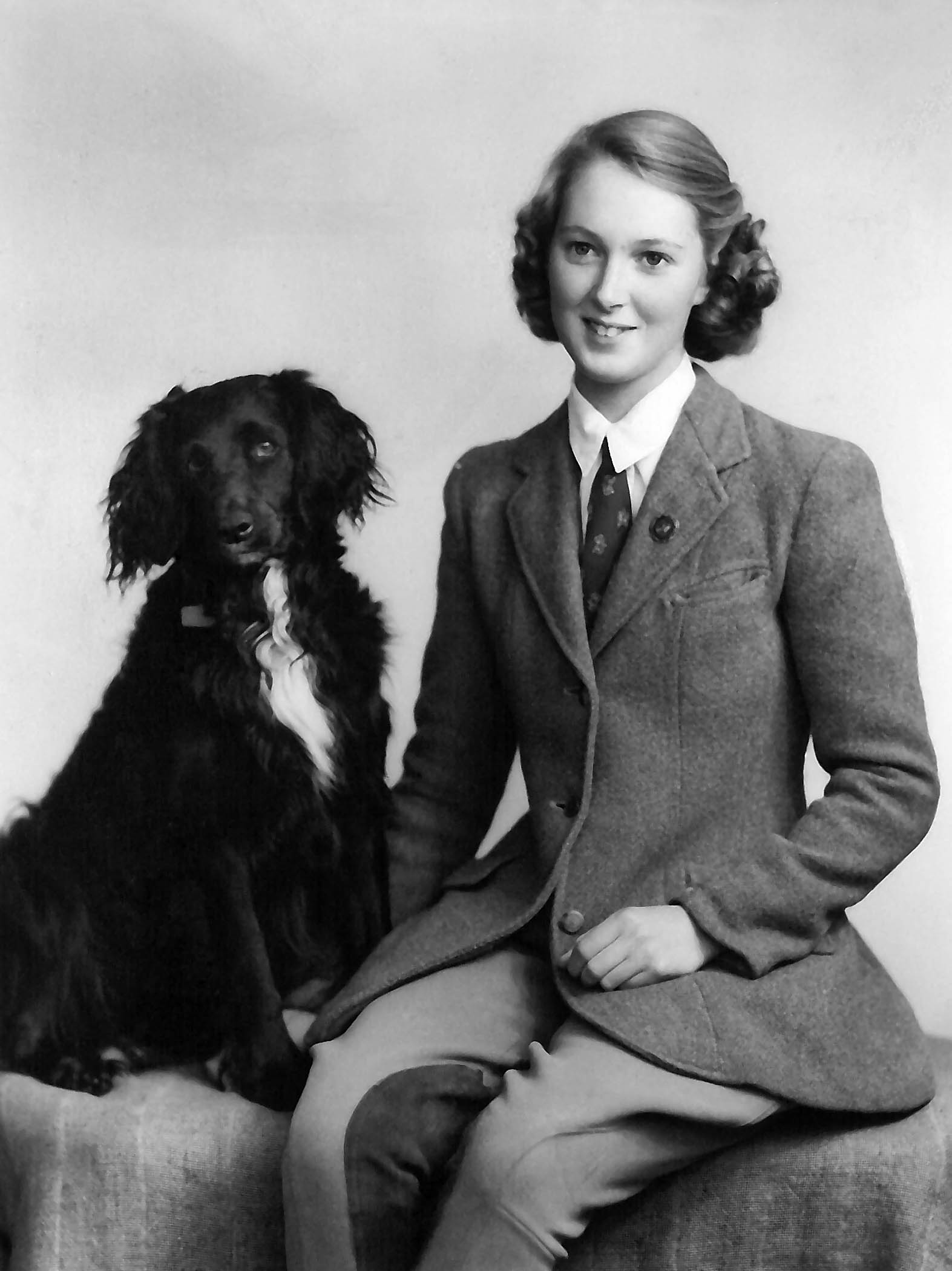 Jane with Rusty. Taken in Bournemouth 1954. Written on the back: "Jane and Rusty the Inseperables"